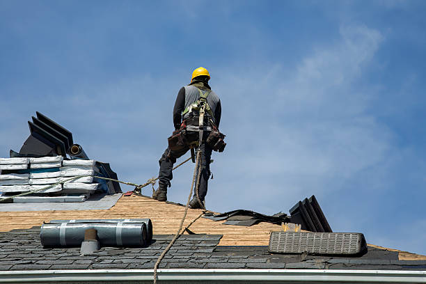 Professional Gutter Installation technician working in Hampton, IA